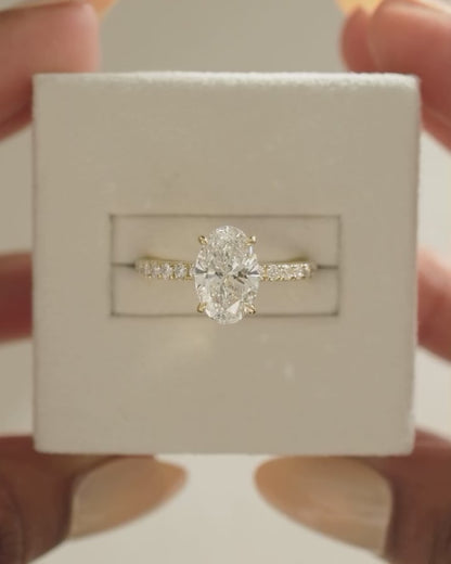IGI Certified 1CT D VVS2 Lab Grown Diamond Oval Cut Solitaire Ring with Side Stones